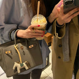 Side view of sophisticated structured handbag