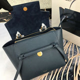 Styled lifestyle shot of polished signature women's handbag – women's luxury accessory