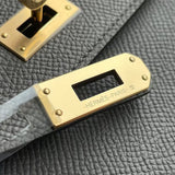 Side view of modernist structured handbag