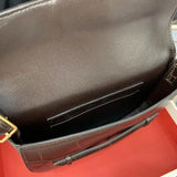 Handle and strap detail of structured statement women's handbag – women's designer-style accessory