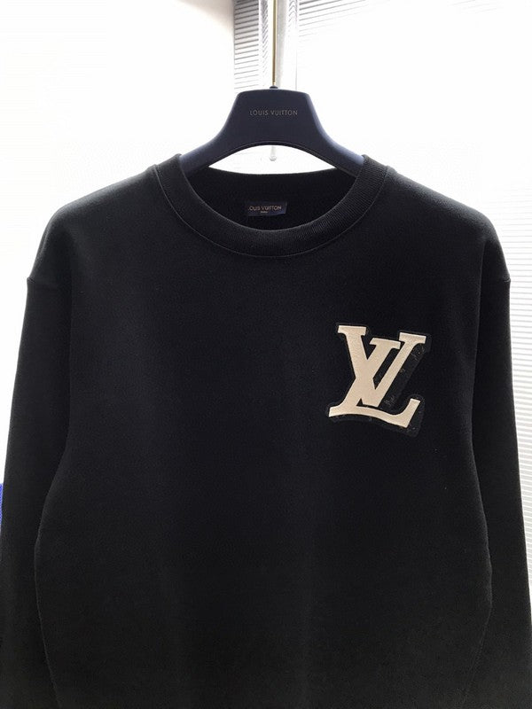 Back view of Louis Vuitton luxury clothing with streetwear-inspired cut