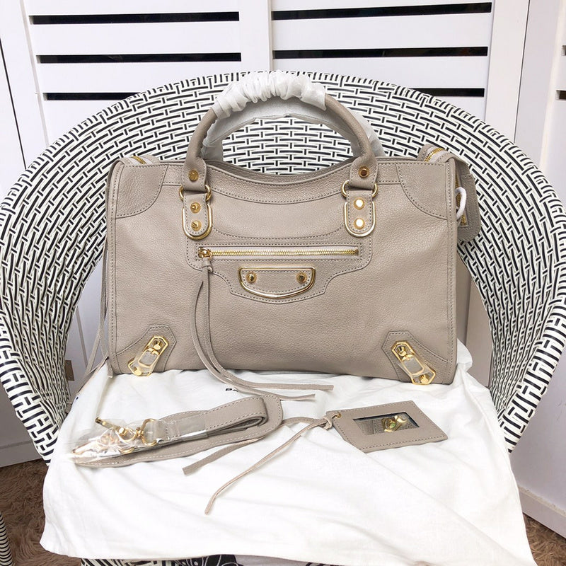 Styled lifestyle shot of everyday-luxe elevated women's handbag – women's luxury accessory