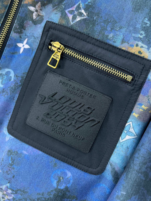 Flat lay presentation of Louis Vuitton luxury clothing with runway-inspired design