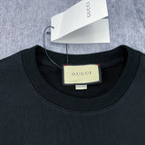 Full styled look of Gucci luxury clothing with signature branding