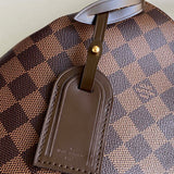 Back view of signature sleek women's handbag – women's luxury handbag