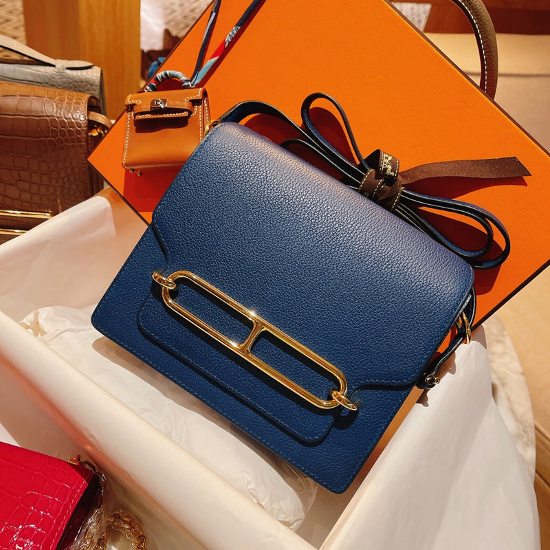 Side view of understated structured handbag