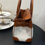 Side view of crisp structured handbag