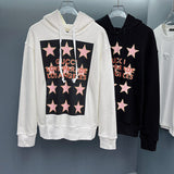 Close-up detail shot of Gucci luxury clothing with logo-detail design