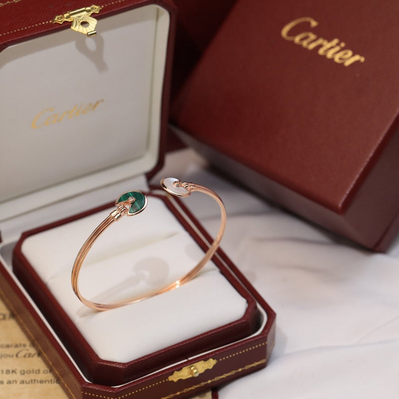 Side view of Cartier unisex jewelry piece