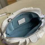 Handle and strap detail of statement modern women's handbag – women's statement bag