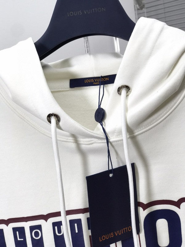 Flat lay presentation of Louis Vuitton luxury clothing with contemporary cut
