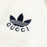 Full styled look of Gucci luxury clothing with logo-detail design