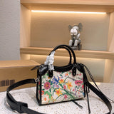 Ziva's Charm handbag – back view (one versatile size)