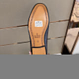 Side profile of Gucci stone beige sneakers premium leather build