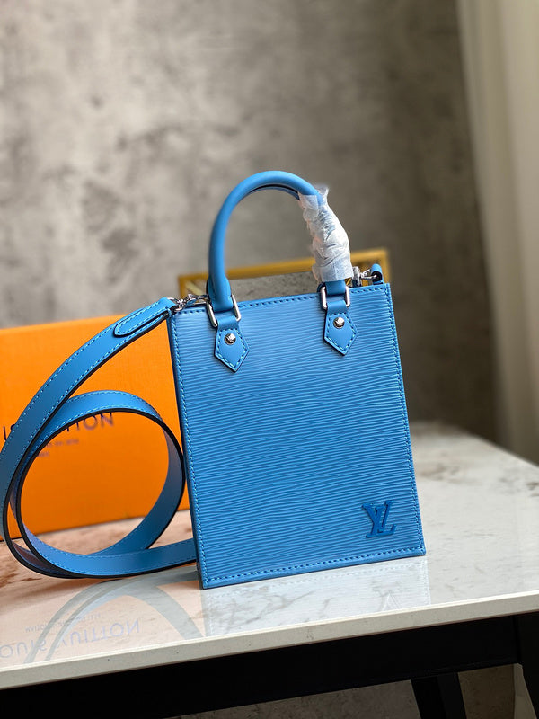 Side profile of modern statement women's handbag – women's everyday handbag