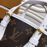 Handle and strap detail of structured modern women's handbag – women's luxury handbag