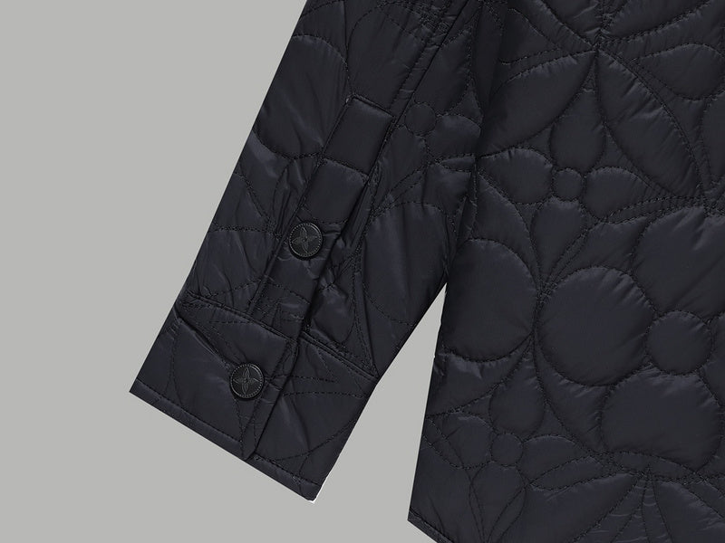 Close-up detail shot of Louis Vuitton luxury clothing with monogram-inspired silhouette