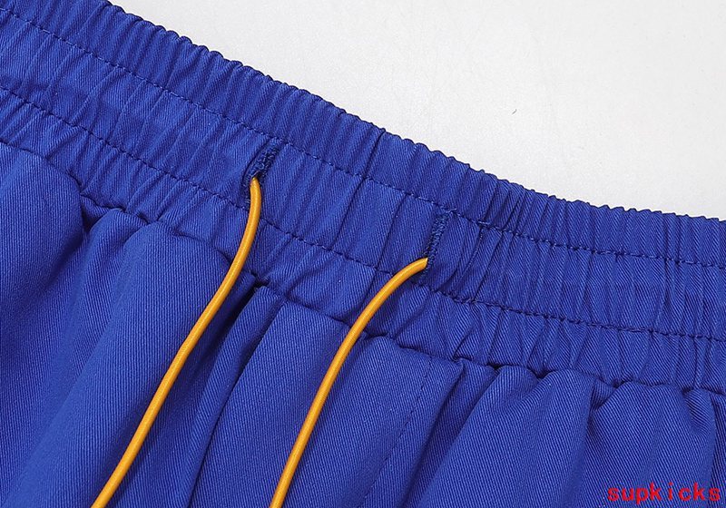 Close-up detail shot of Rhude luxury clothing with streetwear-inspired cut