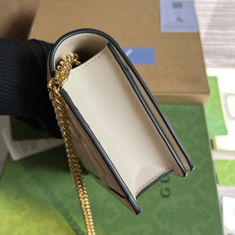 Side view of structured structured handbag