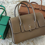 Side view of sculpted structured handbag