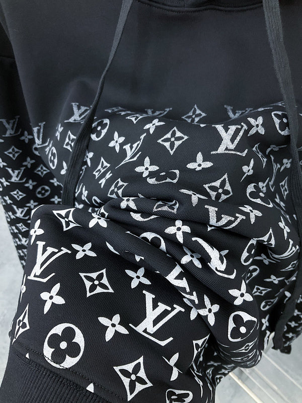 Full styled look of Louis Vuitton luxury clothing with monogram-inspired silhouette