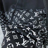 Full styled look of Louis Vuitton luxury clothing with monogram-inspired silhouette