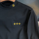 Full styled look of Louis Vuitton luxury clothing with everyday silhouette