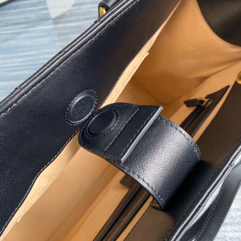 Close-up detail of structured chic women's handbag – women's luxury accessory