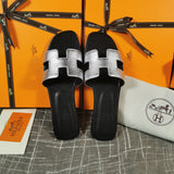 Hermes sandals Style 035 - close-up of statement logo accent