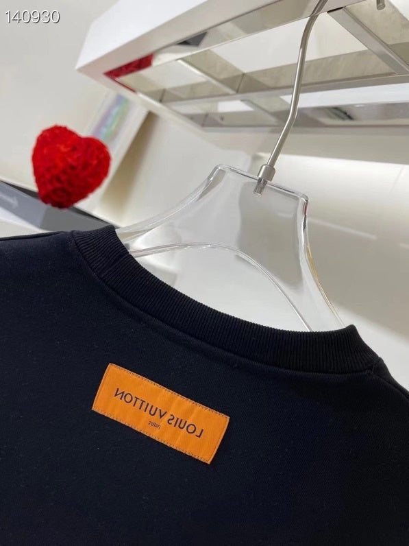 Side profile of Louis Vuitton luxury clothing with runway-inspired design