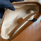 Side profile of classic chic women's handbag – women's luxury accessory