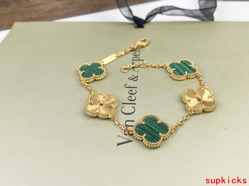 Lifestyle view of Van Cleef & Arpels unisex jewelry piece