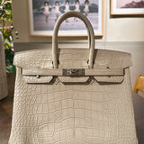  clean-lined crossbody bag detail view showing craftsmanship