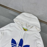Side profile of Gucci luxury clothing with monogram-inspired silhouette