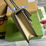 Handle and strap detail of polished statement women's handbag – women's luxury accessory