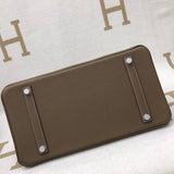 Side view of refined structured handbag