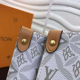 Handle and strap detail of refined polished women's handbag – women's everyday handbag
