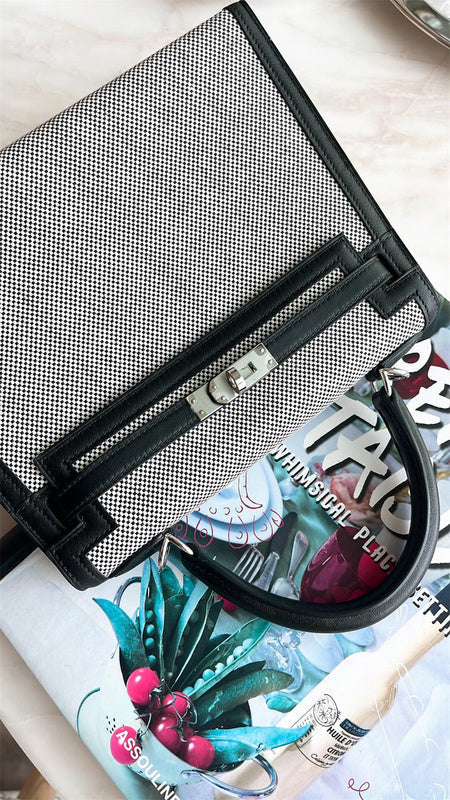  Understated crossbody bag carried on shoulder