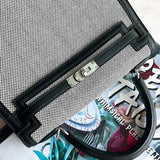  Understated crossbody bag carried on shoulder
