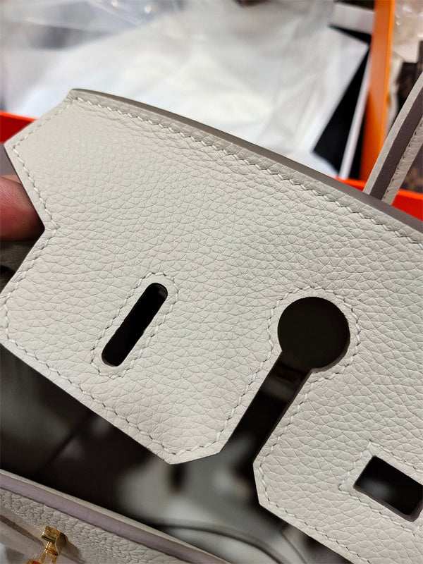  polished shoulder bag detail view showing craftsmanship