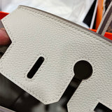  polished shoulder bag detail view showing craftsmanship