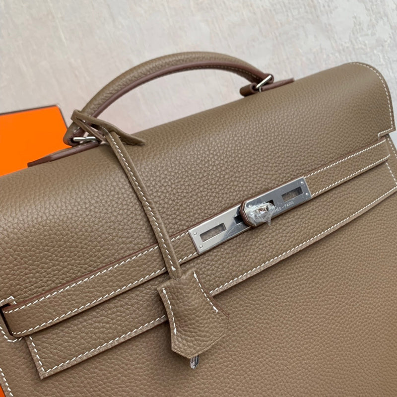 Side view of poised structured handbag