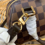Handle and strap detail of elevated polished women's handbag – women's luxury accessory