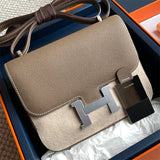 Side view of streamlined structured handbag