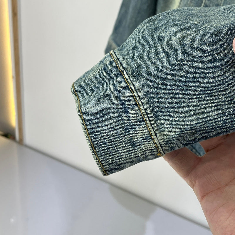 Flat lay presentation of Louis Vuitton luxury clothing with streetwear-inspired cut
