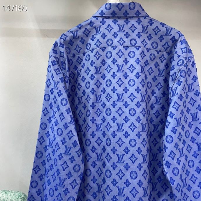 Full styled look of Louis Vuitton luxury clothing with signature branding