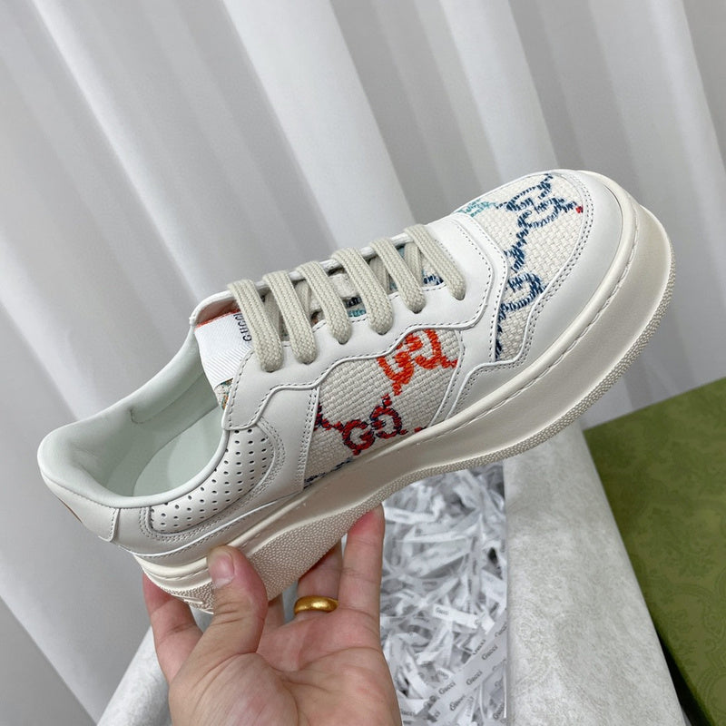 Side profile of Gucci neutral cream sneakers breathable knit upper