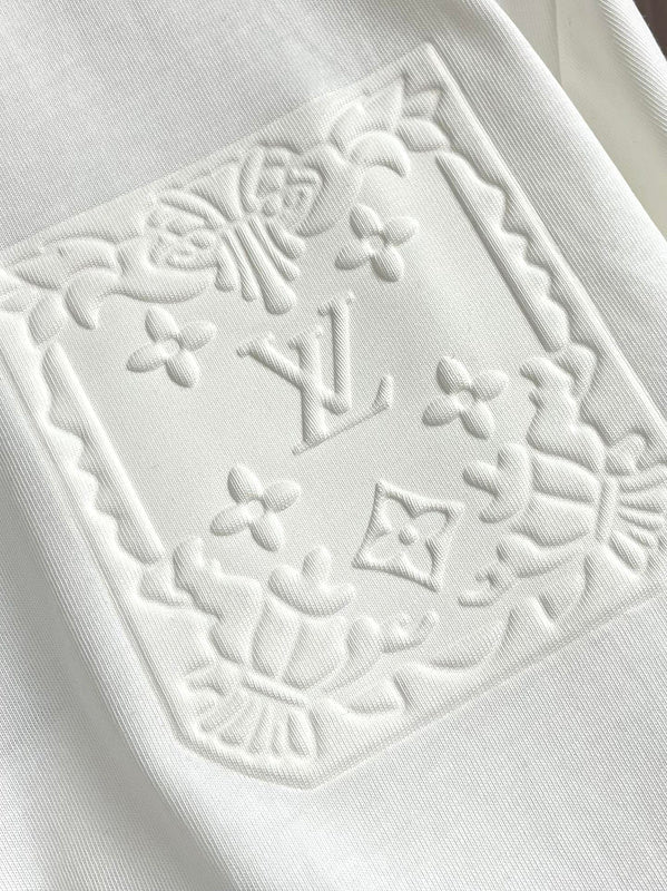 Flat lay presentation of Louis Vuitton cotton t-shirt with logo-detail design