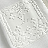 Flat lay presentation of Louis Vuitton cotton t-shirt with logo-detail design