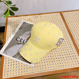 Close-up detail view of Louis Vuitton unisex cap